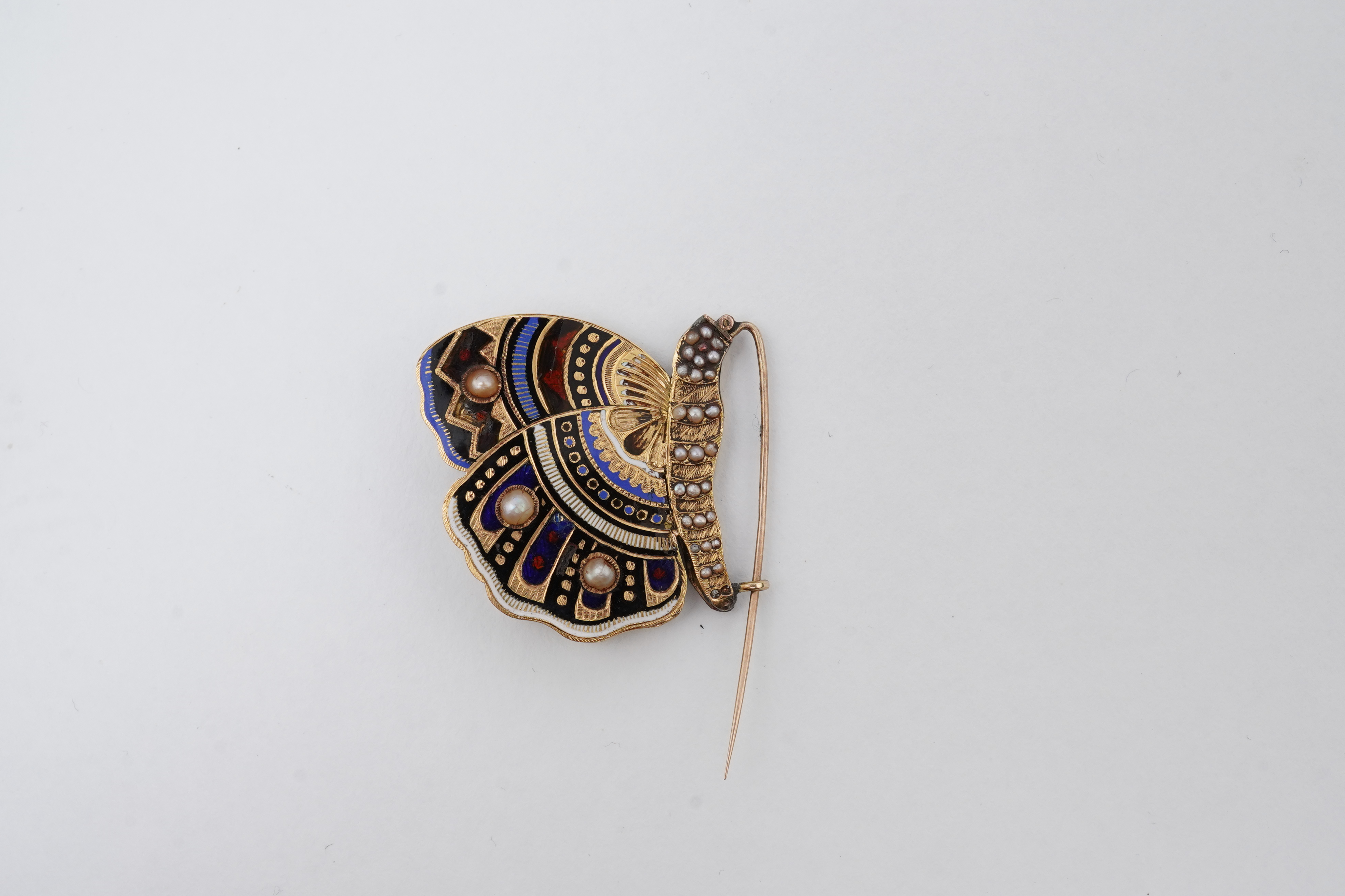 An enamel and seed pearl brooch, circa 1840